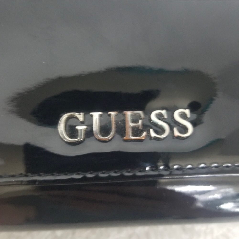 Guess wallet new never used but hardwear has some tarnishing due to storage